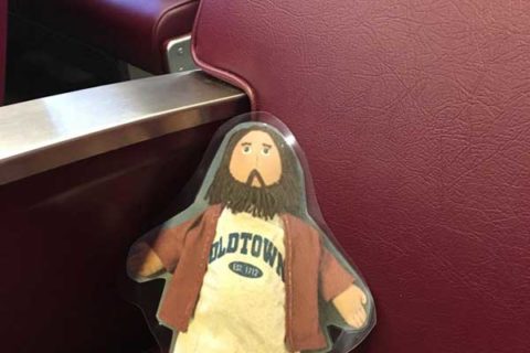 Flat Jesus Rides the Commuter Rail